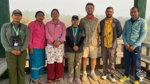 Group photo of Nature Guide, local community people and WWOOFer in core area of National Park