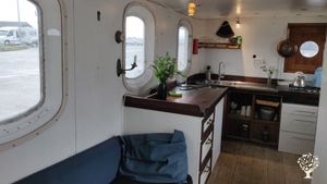 "Small organic farm with sheep, pigs, chickens, and pets, producing wine and food."