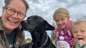 Lotte, dog Nisse and grandchildren.