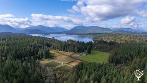 Avalon Farm with Sproat Lake in the background.