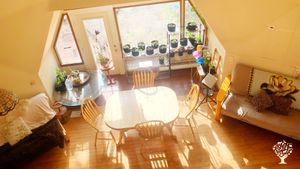 View from the upstairs loft of the downstairs living room
