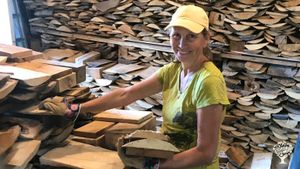 Me stacking wood! In late summer we have a 'stacking party' followed by a pot luck and music jam. 