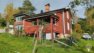 Small lakeside farm in a forested area, currently being developed for permaculture and self-sufficie