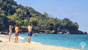 The team down at the beach ( the modest version ) 