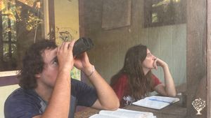 Two bookworms eating through pages, and watching the herd of axis deer in the Vally 