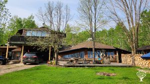 Self sufficient community of artists and plant medicine specialists and woodworkers
