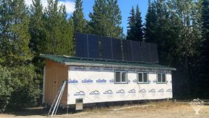 2023 photo of my house, have since added wood stove and 8 more solar panels