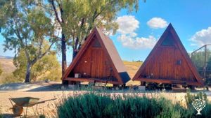 A-frame houses with two beds each to accommodate