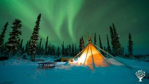community tipi under the aurora