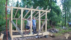WWOOFers building a little cabin
