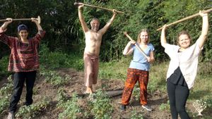 volunteers working on the farm