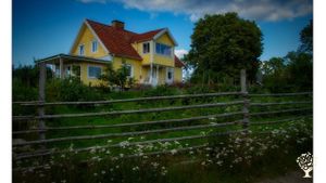 Farm house with some of the forest garden in front. 