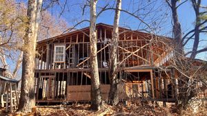 Community bldg w/ kitch & 4 bedrooms— Tobie’s big project.  Learn basic construction techniques.