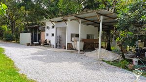 The workshop/store has a two bed loft room,  kitchen & fridge, shower room/toilet and living room.