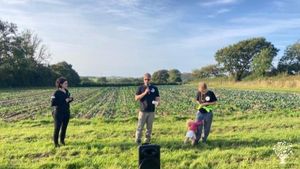 Organic field scale vegetable production farm with humans, animals and ecosystems working together