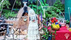 Me Baking at my Cob Oven