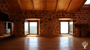 Upstairs: living and sleeping area with sea view.