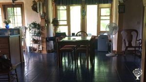 Open plan kitchen and dining room.  Large smart TV with shared seating in this space all meals here