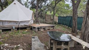 Canvas bell tent with electricity and water