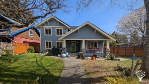 Small town urban home with organic garden close to amenities and recreational opportunities.