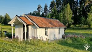 The cottage that you will stay in. Outside you have horses and sheep.