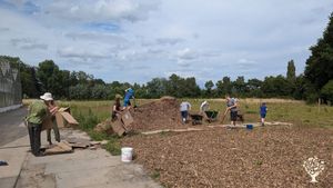 Young non-profit food forest outdoor and in a greenhouse.